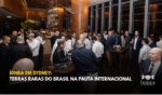Convidados conversando em um salão com janelas amplas durante o sunset party em Sydney. Título: Ígnea em Sydney: Terras Raras do Brasil na Pauta Internacional.